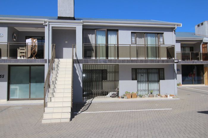 For Sale: Hartenbos Central Apartment with balcony, braai, and secure parking.