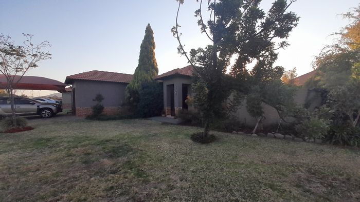 House for Sale in Waterkloof East: Open plan living, fruit trees, park access.