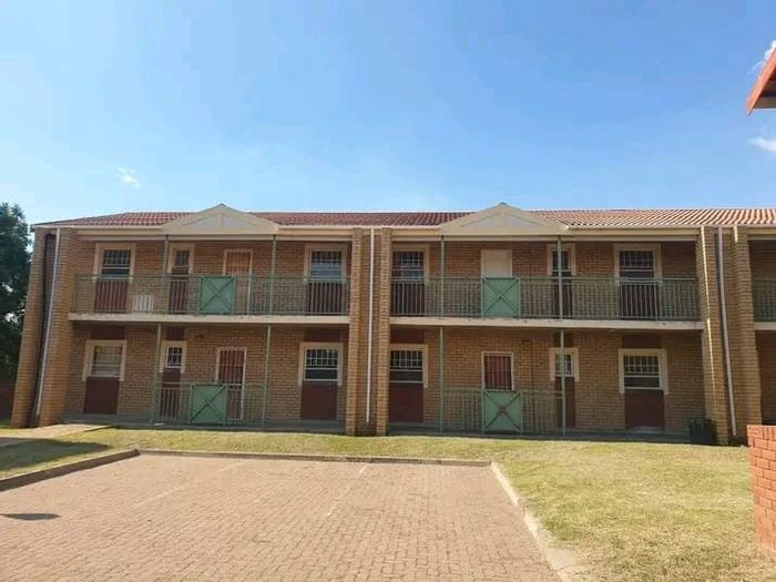 2-bedroom apartment for sale in Mmabatho with parking, security, and central location.