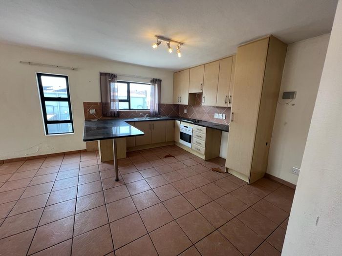 Two-bedroom apartment in Fairland with balcony, braai, and prepaid utilities. To Rent.