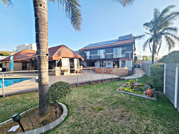 For Sale: House in Freeway Park with pool, cottage, and multiple entertainment areas.