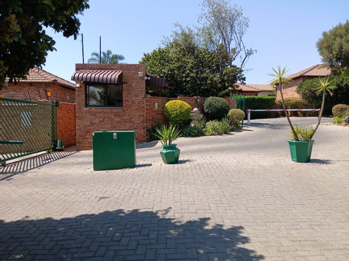 For Sale: 3 Bedroom Townhouse in Radiokop with pool, security, and pet-friendly garden.