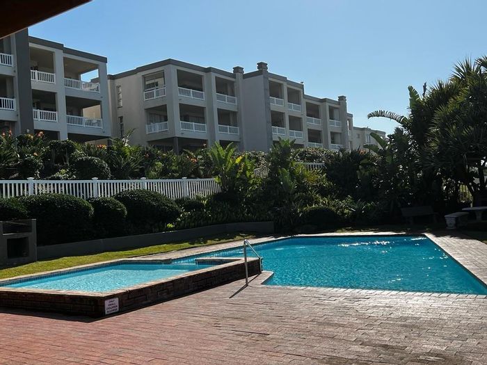 For Sale: Apartment in Uvongo with beach access, pools, tennis court, and garage.