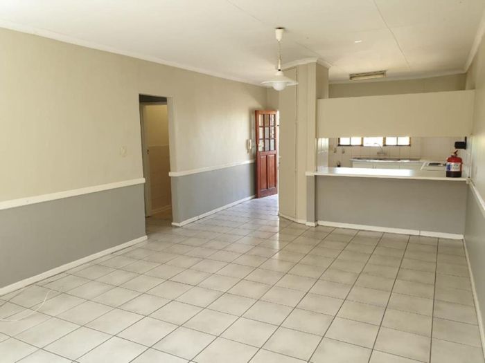 For Sale: Langenhovenpark Apartment with 3 bedrooms, secure complex, and rental potential.