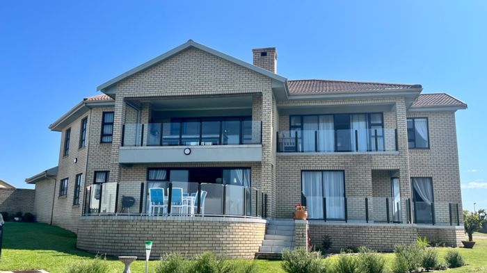 For Sale: House in Mossel Bay Golf Estate with golf course views and amenities.