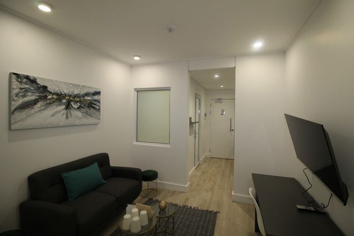 For Sale: Apartment in Woodstock with pool, retail space, and secure access.