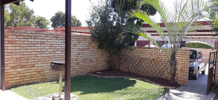 For Sale: Townhouse in Heuwelsig Estate with private garden and biometric security.