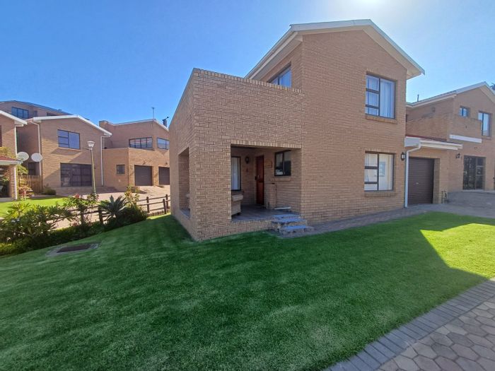 For Sale: Townhouse in Menkenkop with private balcony, garage, and communal pool.