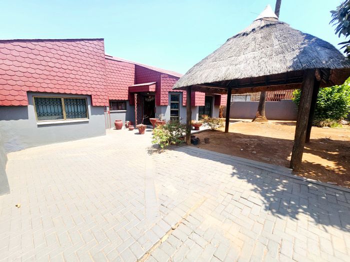 Laudium House For Sale: Open plan living, prayer room, cottage, electric fencing.