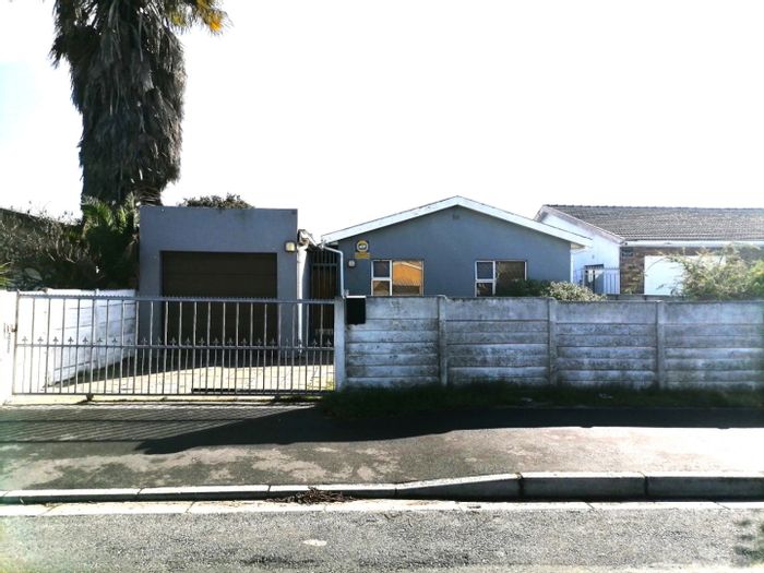 For Sale: House in Lotus River with dual dwellings, yard space, and garage.