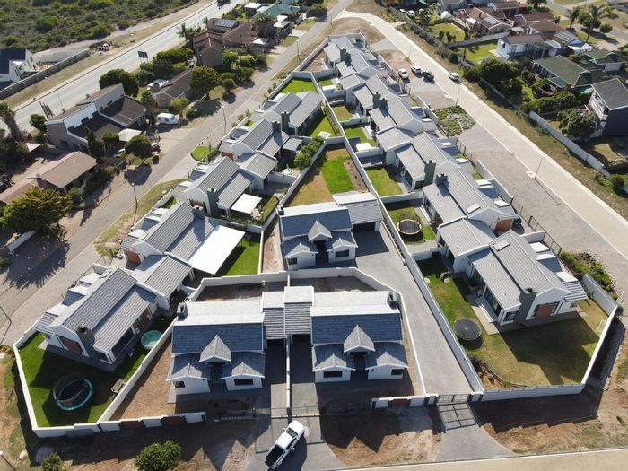 For Sale: House in Hartenbos Heuwels with 3 beds, garage, and outdoor space.