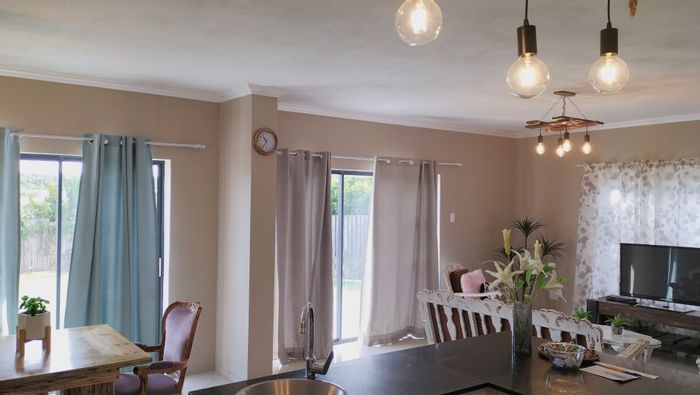 Wavecrest House For Sale: Spacious 3-bed, open-plan living, outdoor braai area.