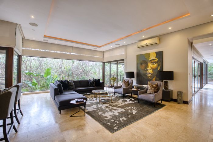 Zimbali House For Sale: 4 bedrooms, en-suites, bar area, open living spaces.