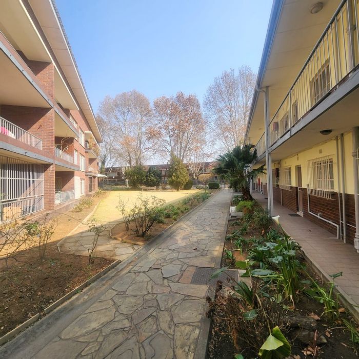 2 Bedroom Apartment For Sale in Benoni Central with garage, balcony, and security.