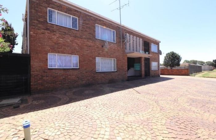 Casseldale Apartment For Sale: Secure living with open-plan layout and patio access.