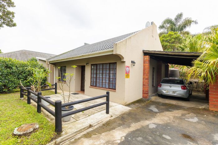 For Sale: Umtentweni Townhouse with 2 bedrooms, patio, garden views, and parking.