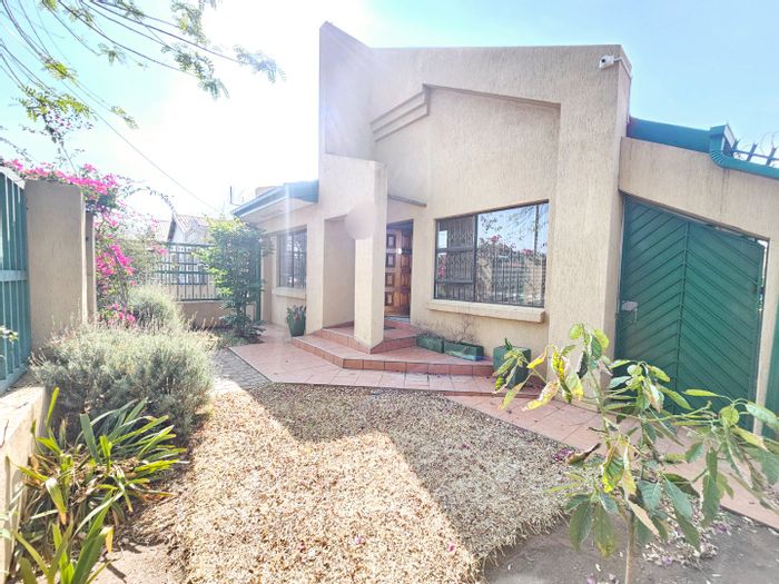 For Sale: Spacious 3-bedroom house in Laudium with office, garage, and security features.