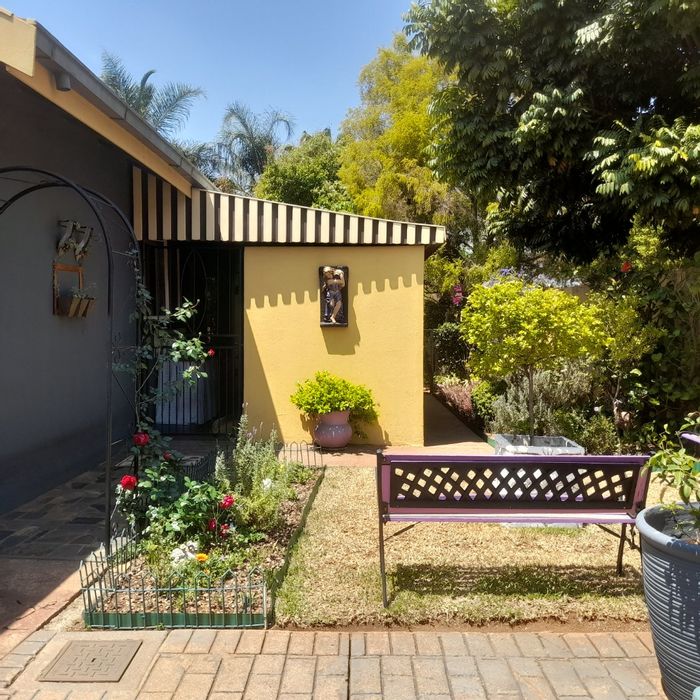 House For Sale in Pretoria North: 3 Bedrooms, gourmet kitchen, double garage, serene garden.