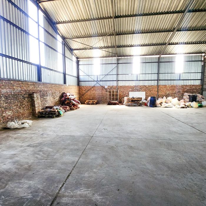 Industrial property for sale in Stilfontein Central with warehouse, offices, and parking.