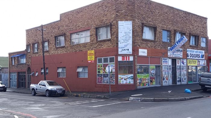 For Sale: Goodwood Central Commercial Property with 5 Flats and 4 Shops.