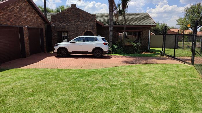 For Sale: Rooihuiskraal House with 4 bedrooms, entertainment room, and secure garden.