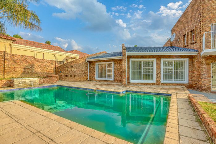 For Sale: House in Sunninghill with pool, garden, and guest room potential.