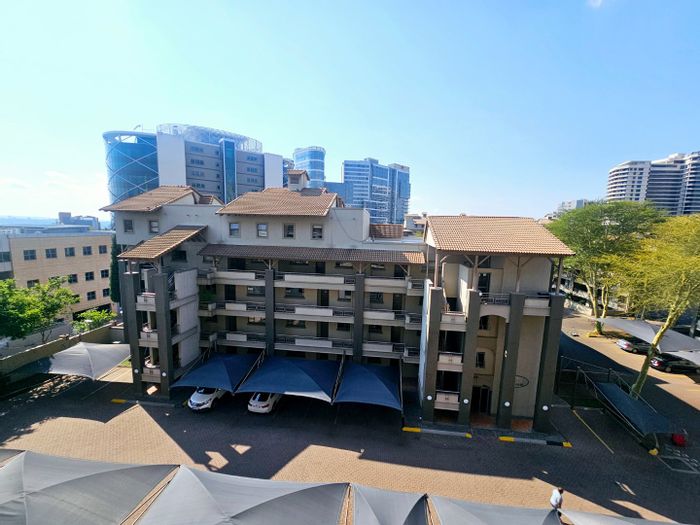 2 Bed, 2 Bath Apartment To Rent in Sandton Central with balcony and amenities access.