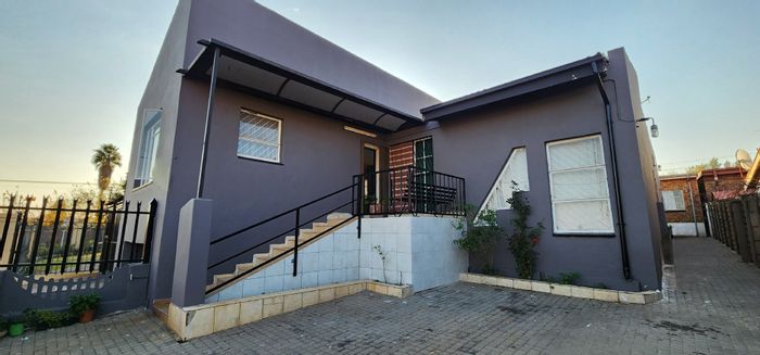 Laudium House For Sale: Multi-unit investment with secure parking, near schools and shops.