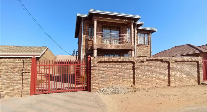 For Sale: Spacious 6-bedroom house in Atteridgeville with rental potential and secure parking.