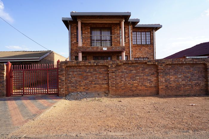 For Sale: Spacious 6-bedroom house in Atteridgeville with rental potential and secure parking.