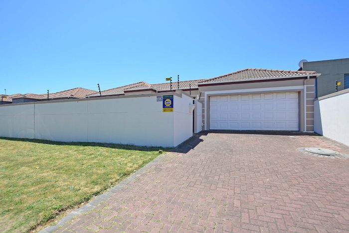 For Sale: House in Parklands with 4 bedrooms, large garden, and double garage.