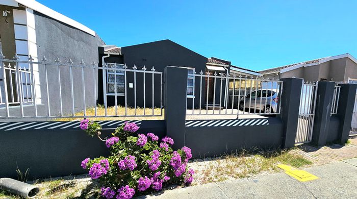 For Sale: Two-bedroom house in Strandfontein Village with ample parking and conversion potential.