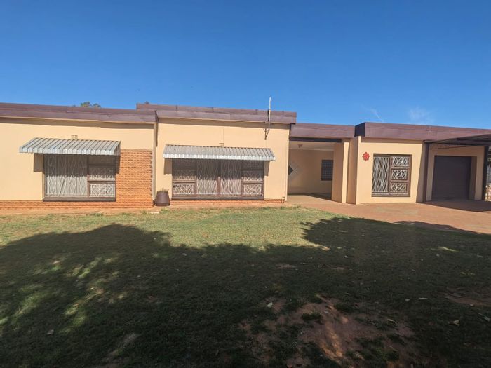 Rensburg House For Sale: Three bedrooms, spacious garden, built-in braai, renovation potential.