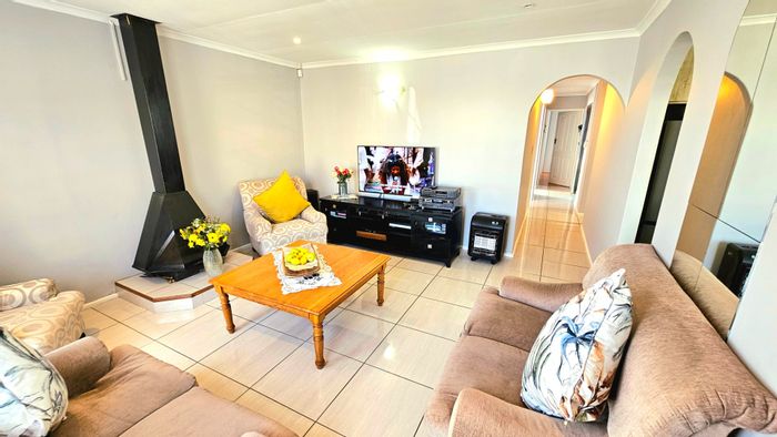 For Sale: House in Strandfontein Village with garage, entertainment area, and security cameras.