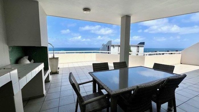 For Sale: Manaba Beach Apartment with 3 bedrooms, ocean views, and parking.