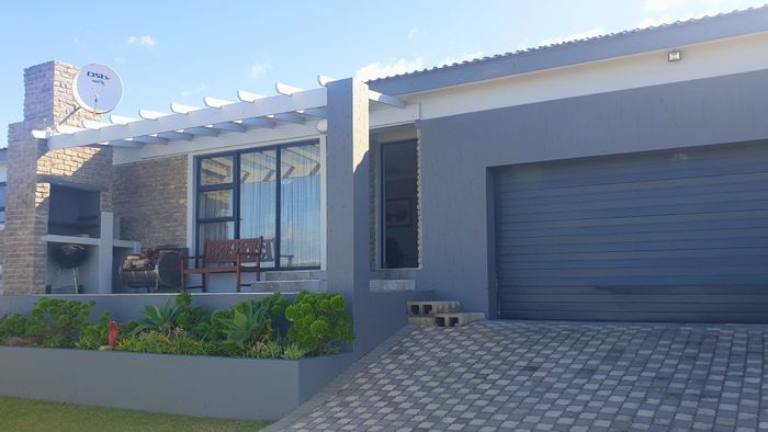 For Sale: 3-Bedroom Townhouse in Dana Bay with garden, braai area, and garage.