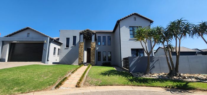 For Sale: House in Copperleaf Estate with pool, garage, and golf course access.