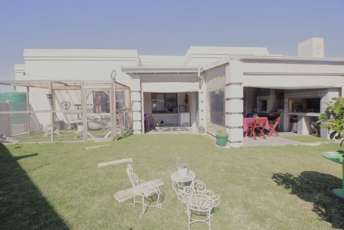 Wavecrest House For Sale: Spacious home with garden, braai area, and close amenities.