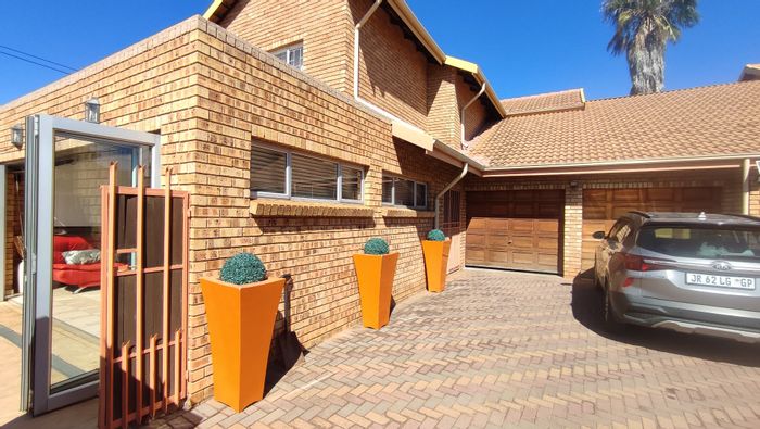 For Sale: Rooihuiskraal North House with Pool, Study, Double Garage, and Inverter.