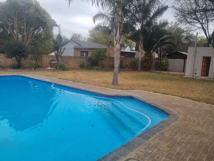 Rynfield House For Sale: Open-plan living, pool, staff quarters, and granny flat.