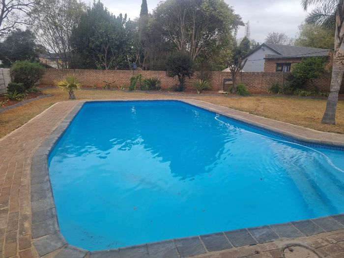 Rynfield House For Sale: Open-plan living, pool, staff quarters, and granny flat.