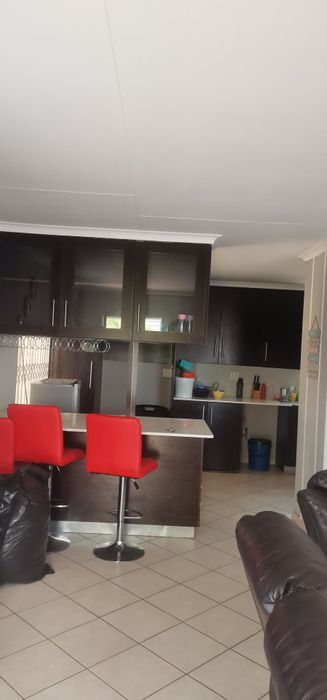 House To Rent in Blue Hills AH: Secure complex, spacious living, double garage, braai area.