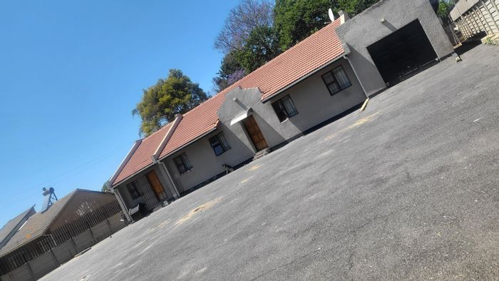 For Sale: 6-bed house in Bloubosrand, income-generating, ample space for expansion.