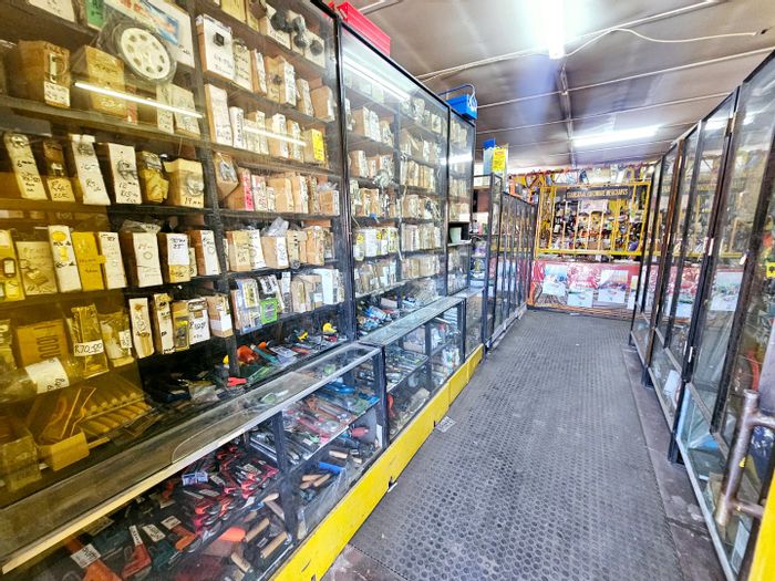 Commercial property for sale in Pretoria West with steel shelving and stock available.