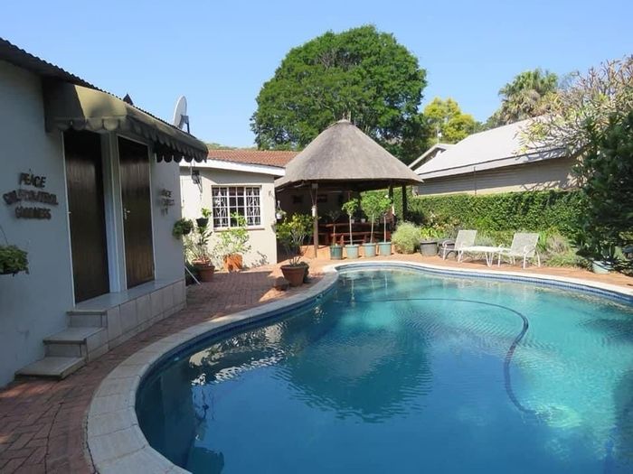 For Sale: House in White River Ext 1 with pool, cottages, and solar power.