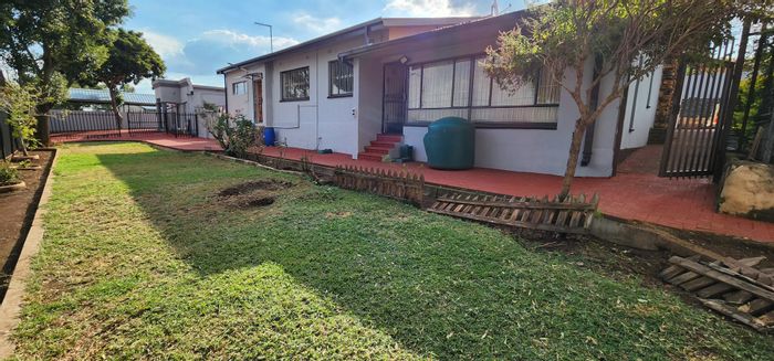 Erasmia House For Sale: 3 rental units, spacious garden, double garage, prime location.