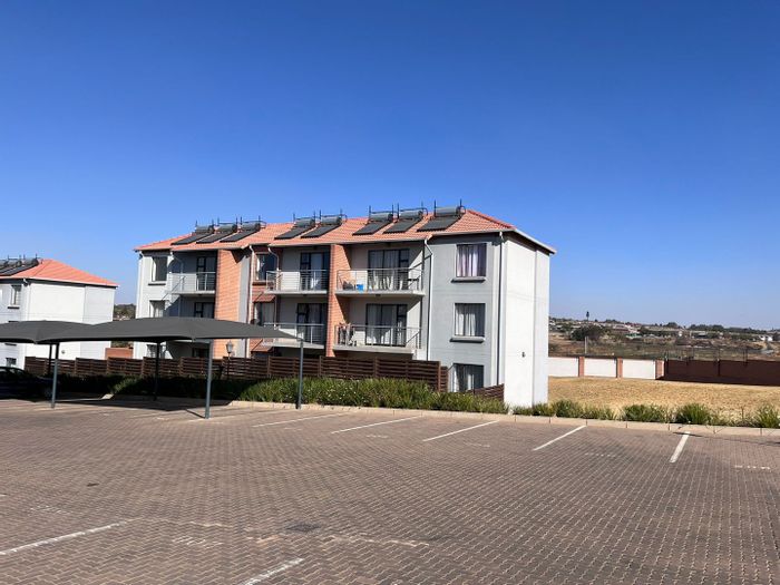 2-Bedroom Apartment For Sale in Noordwyk with balcony, parking, and convenient access.