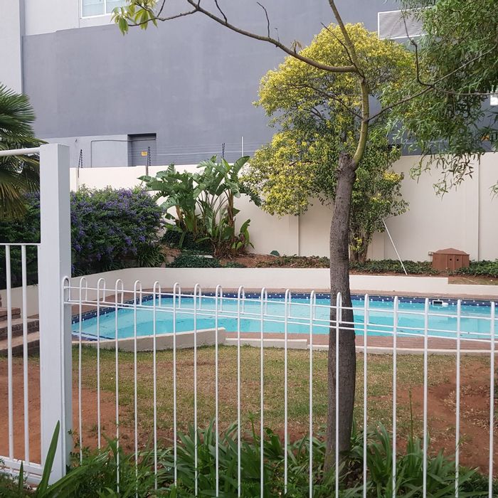 3-Bedroom Apartment in Sandown with garden, pool access, and security. To Rent.