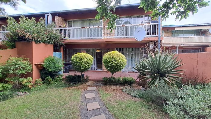 For Sale: Townhouse in Fichardt Park with garden, garage, and two bedrooms.