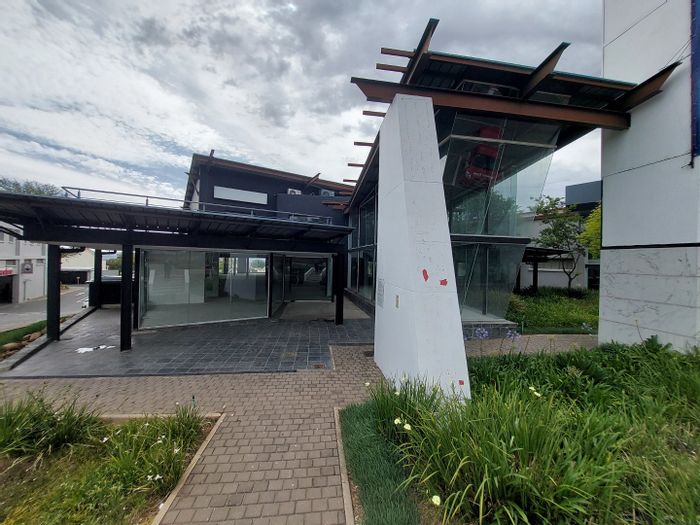 High-visibility commercial space to rent in Bryanston with customizable layout and security.